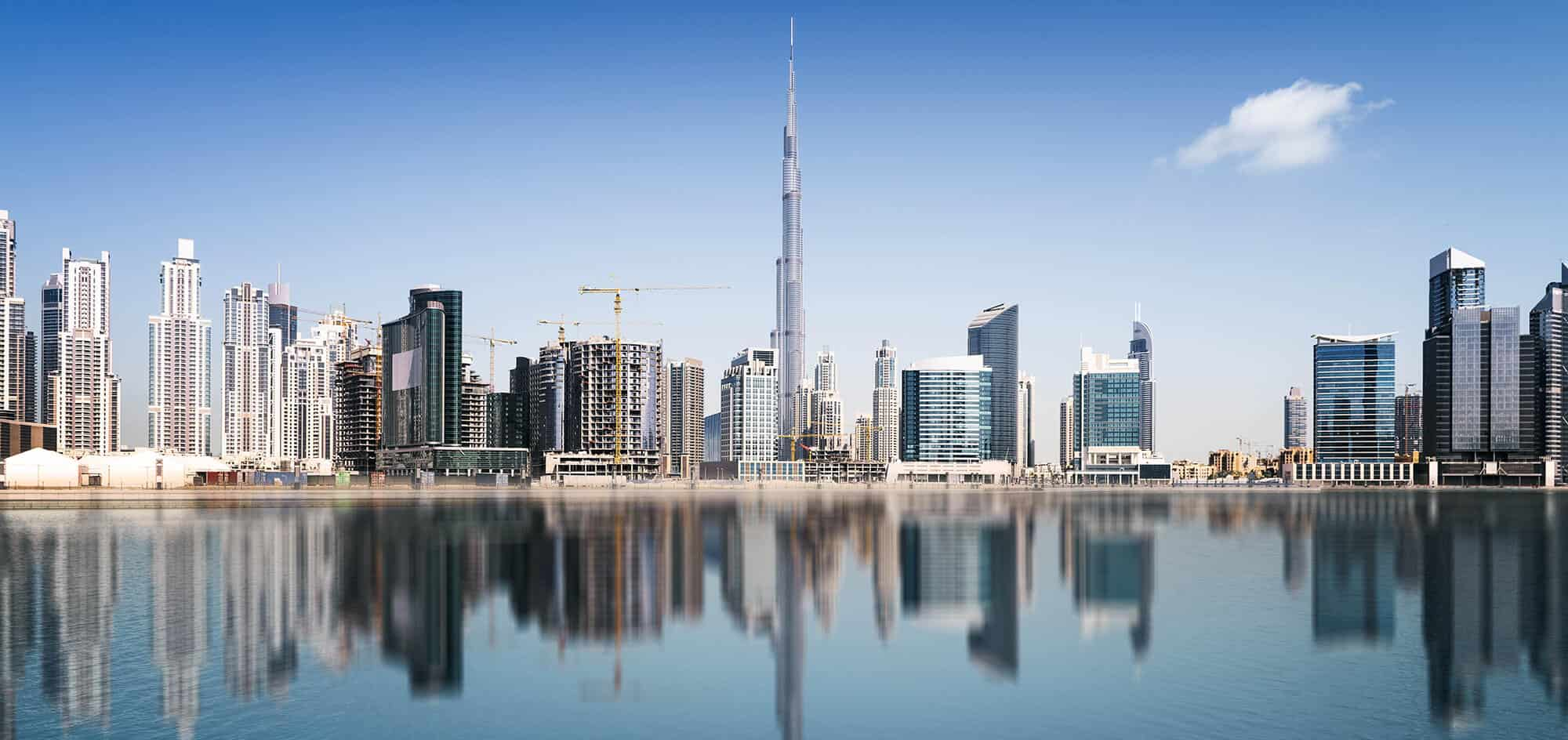 Dubai companies. Дубай панорама. Небоскребы Дубая ночью. Dubai Skyline. Дубай Горизонт панорама.