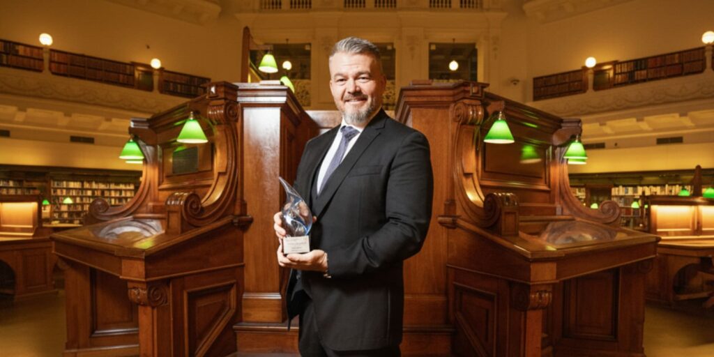 Monash Business School honors Scott Cairns with Professional Achievement Award